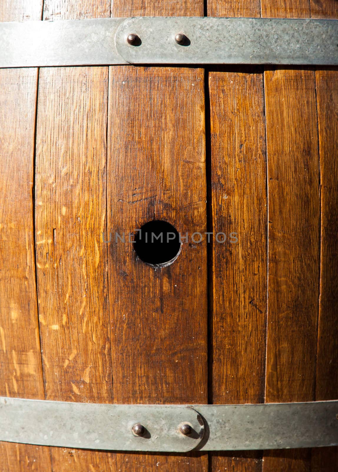 Old barrel made of wood used for Italian wine production