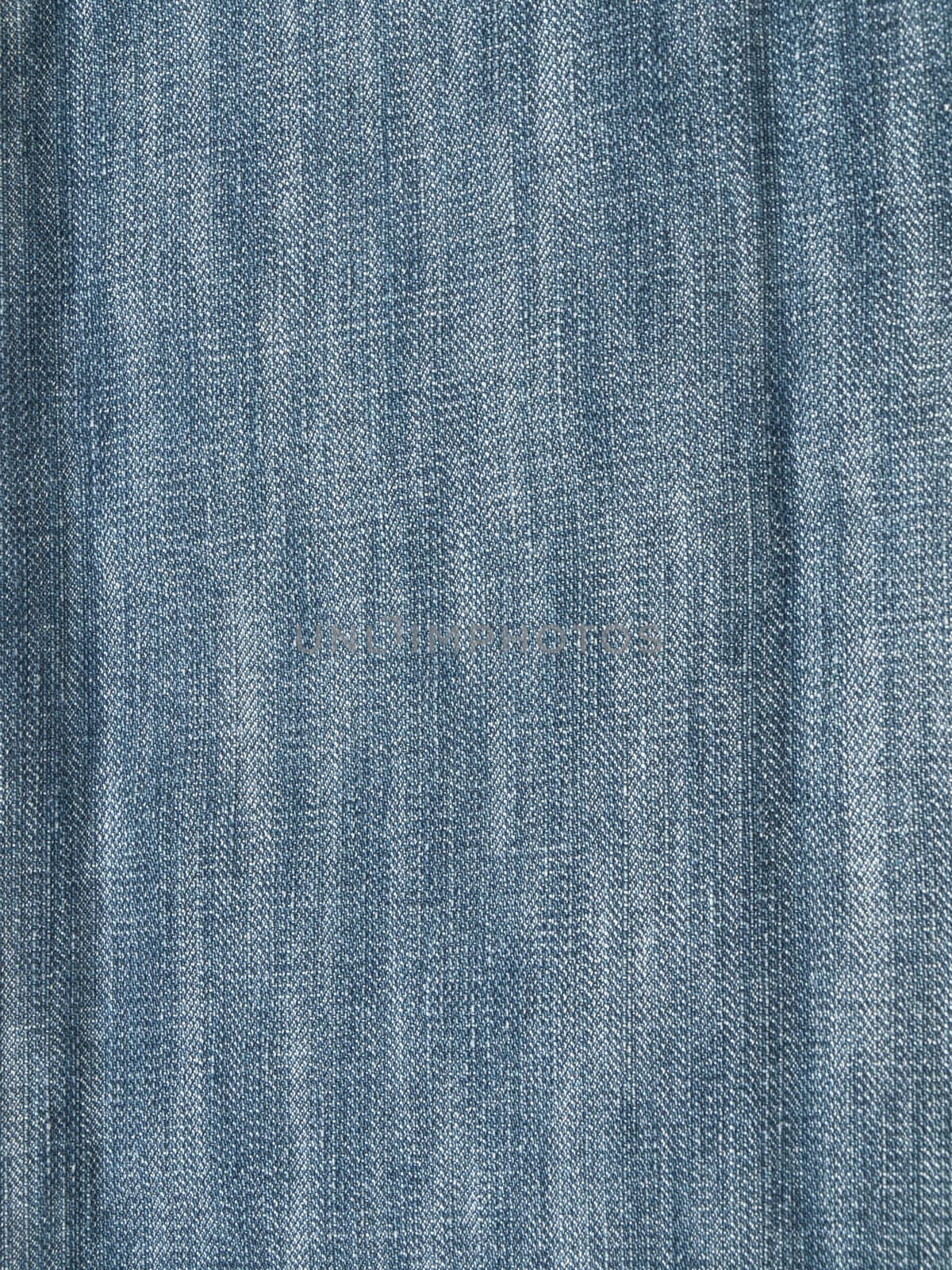 Striped textured used blue jeans denim fabric grunge background