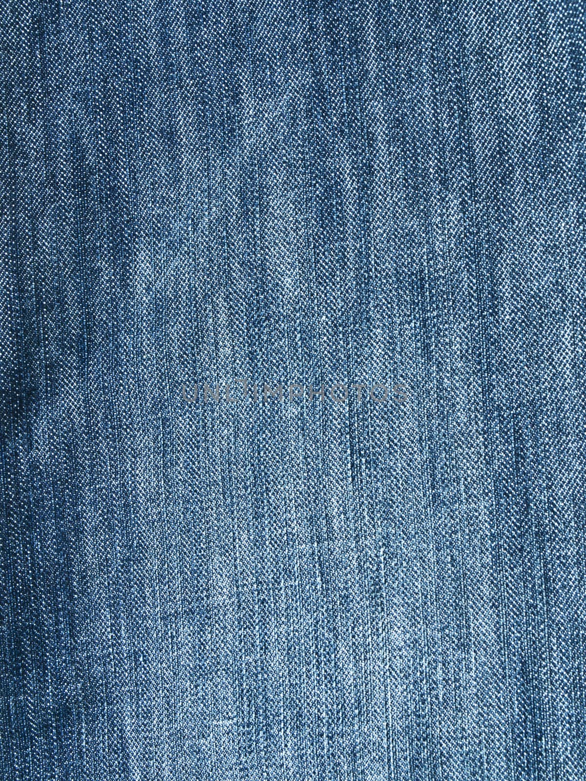 Striped textured used blue jeans denim fabric grunge background