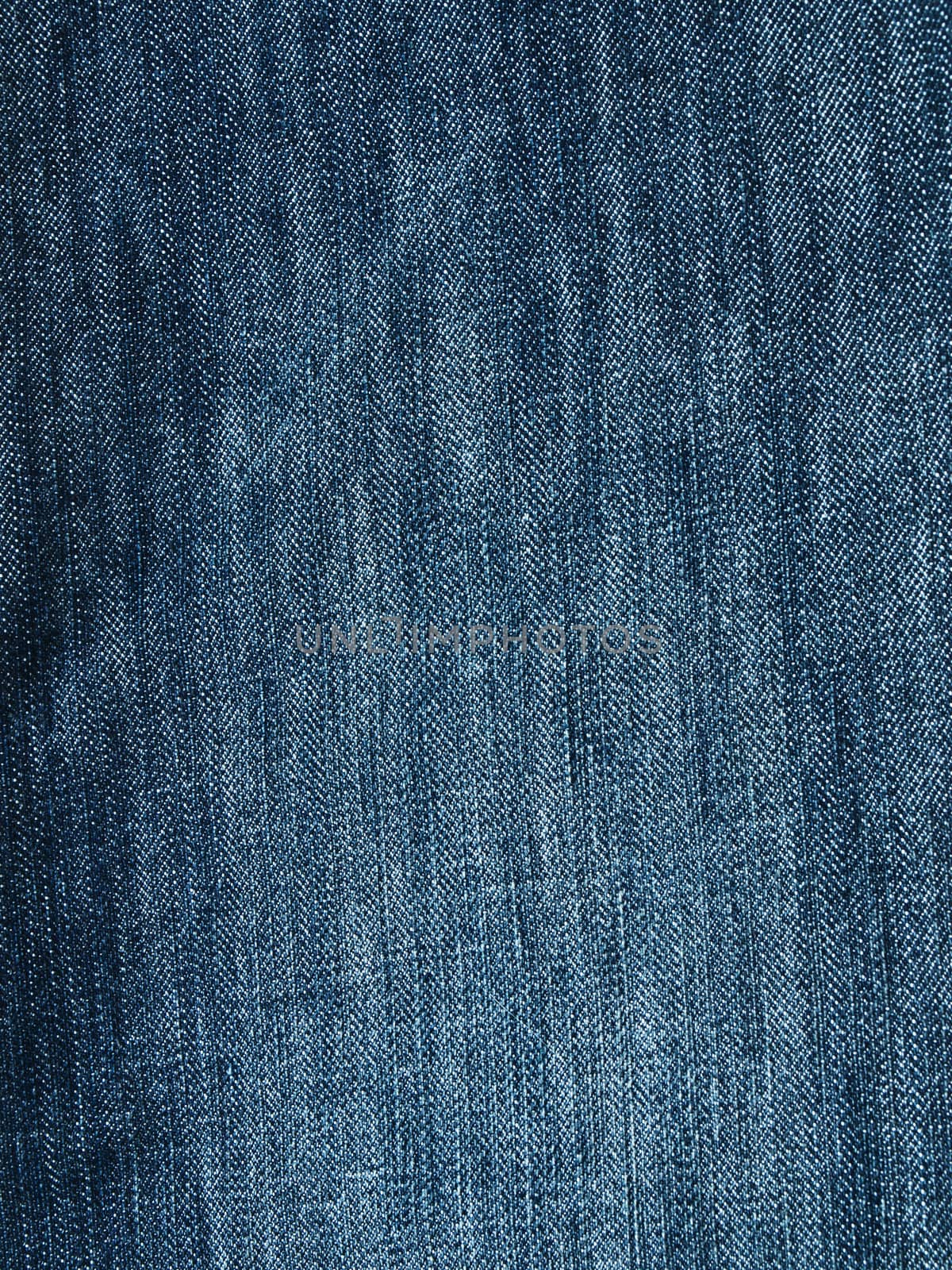 Striped textured used blue jeans denim fabric grunge background