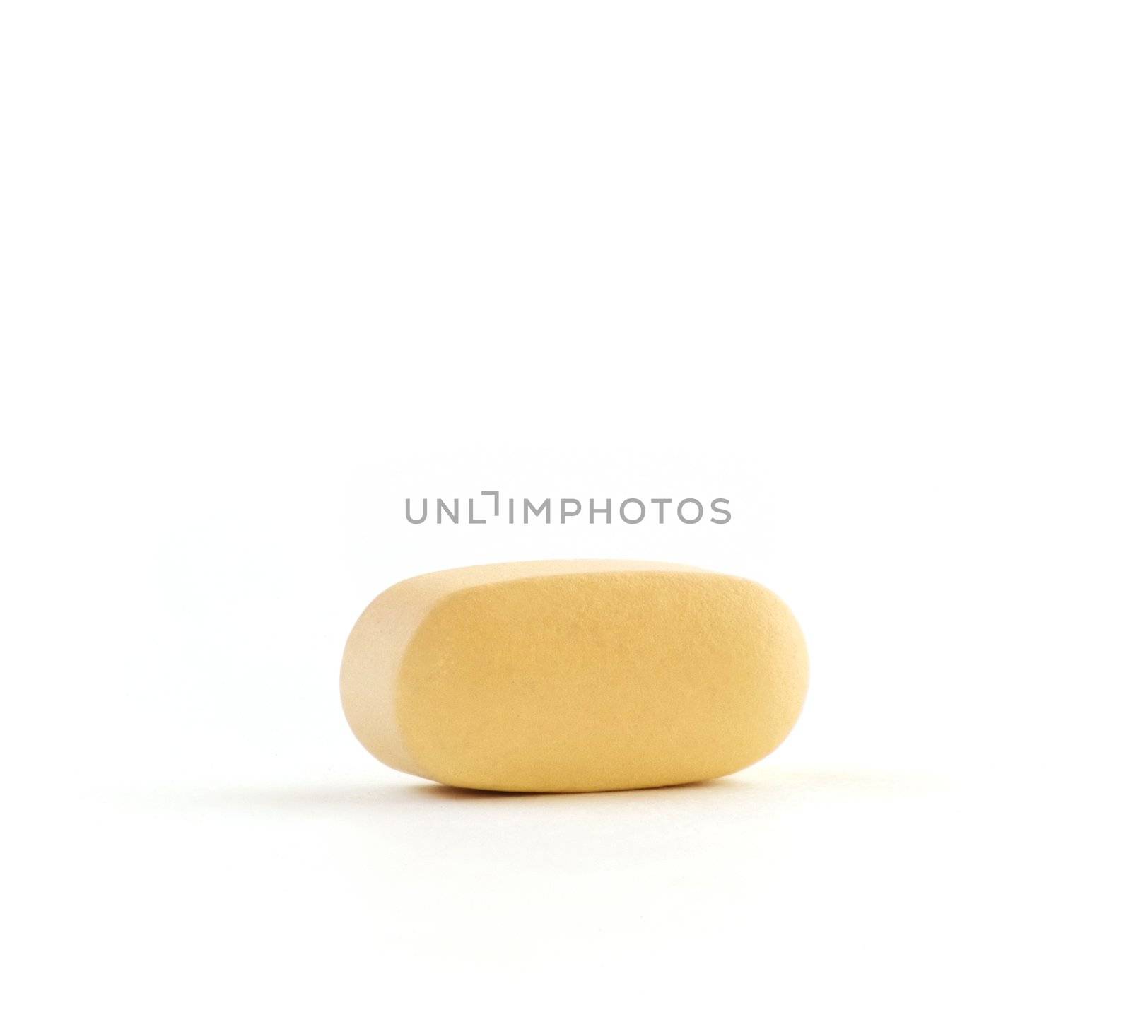 Orange Daily Vitamin Isolated Against a Pure White Background