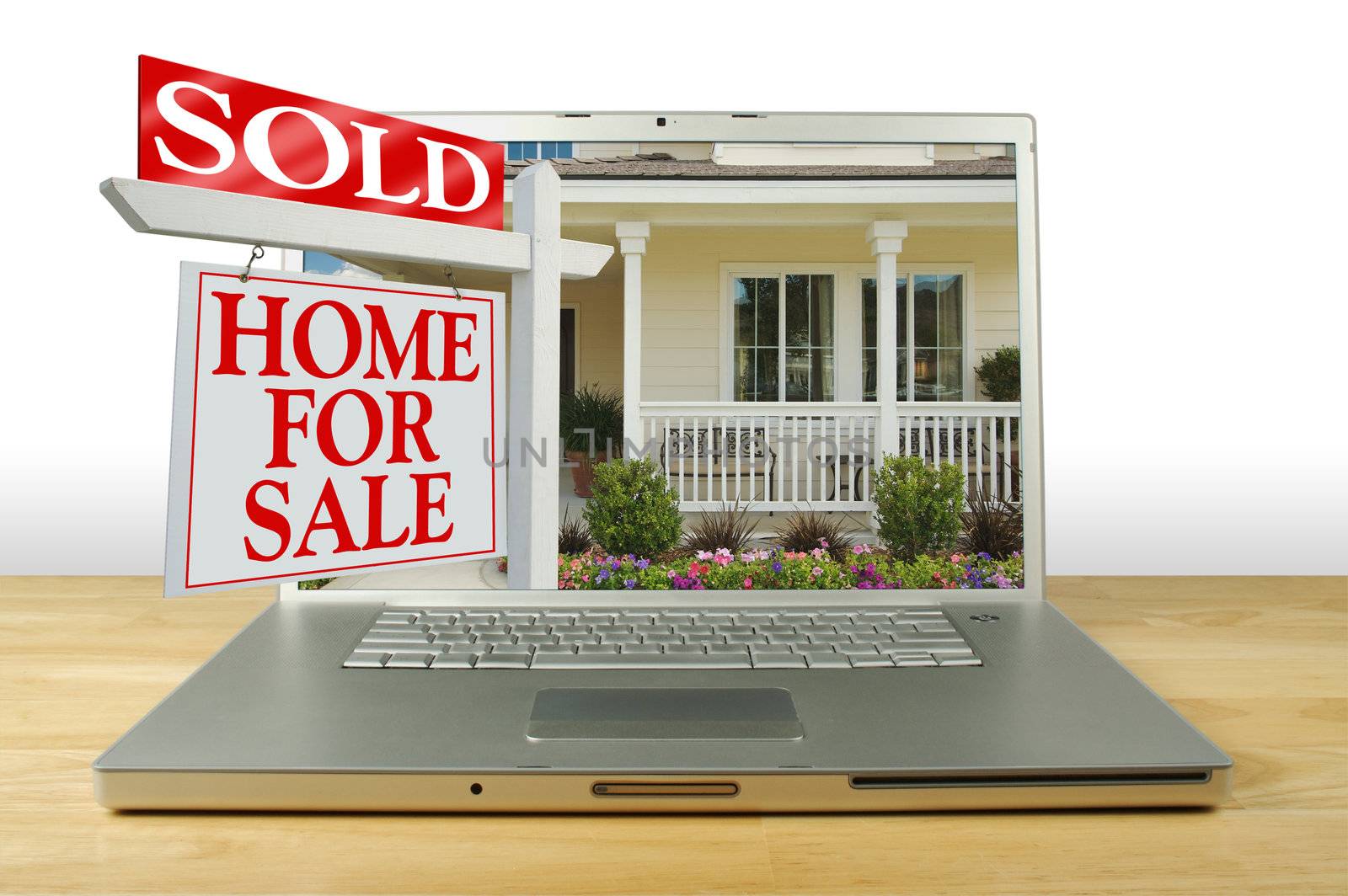 Sold Home For Sale Sign on Laptop by Feverpitched