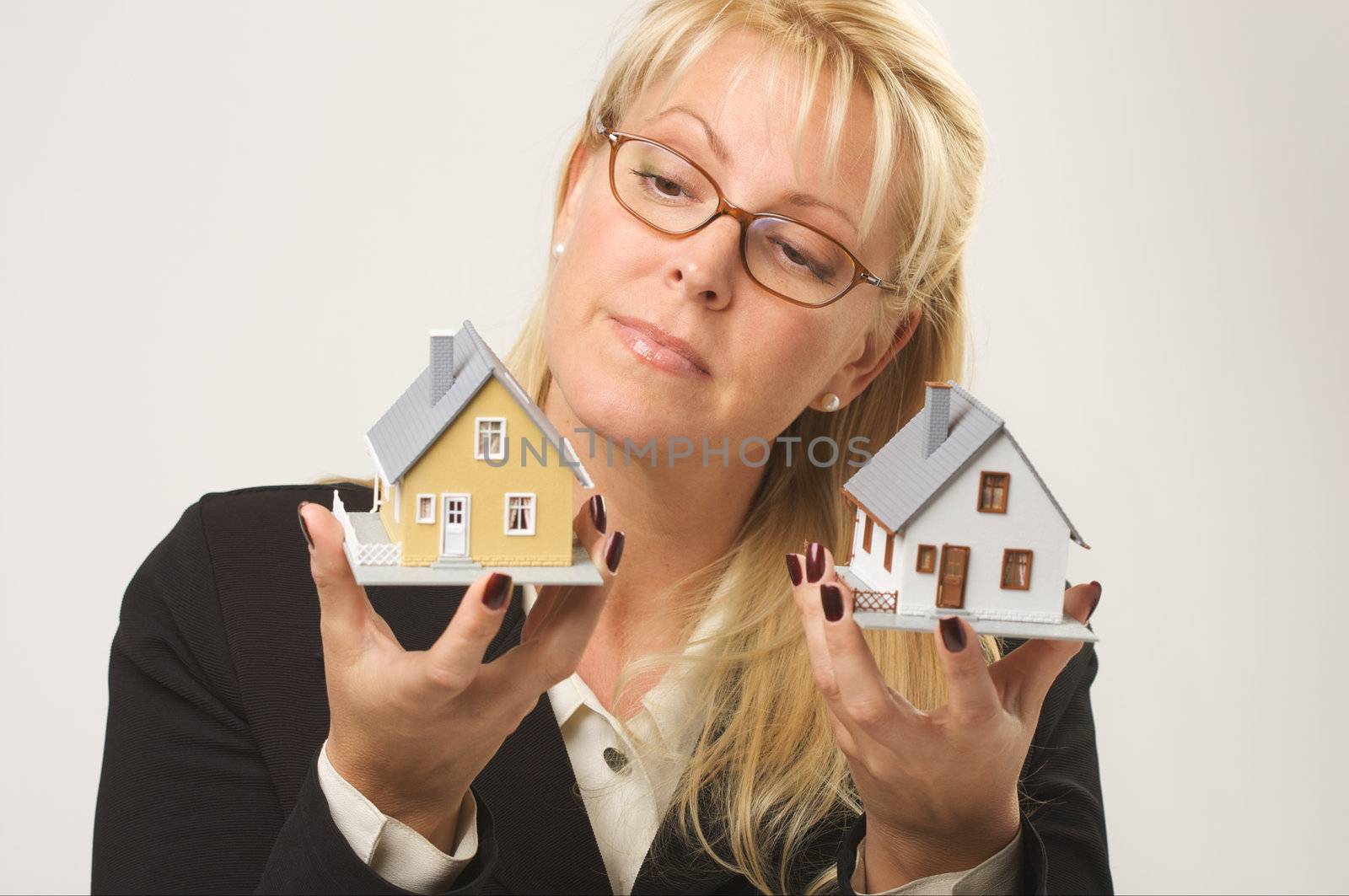 Woman Holding Two Houses by Feverpitched