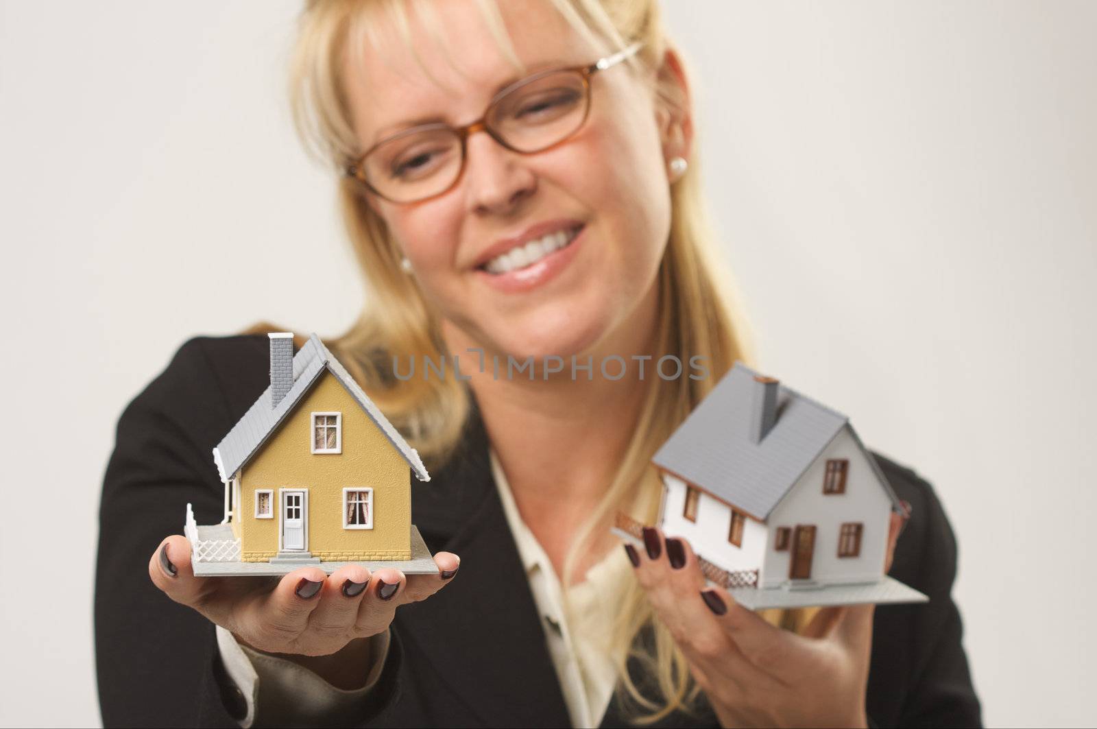 Woman Holding Two Houses by Feverpitched
