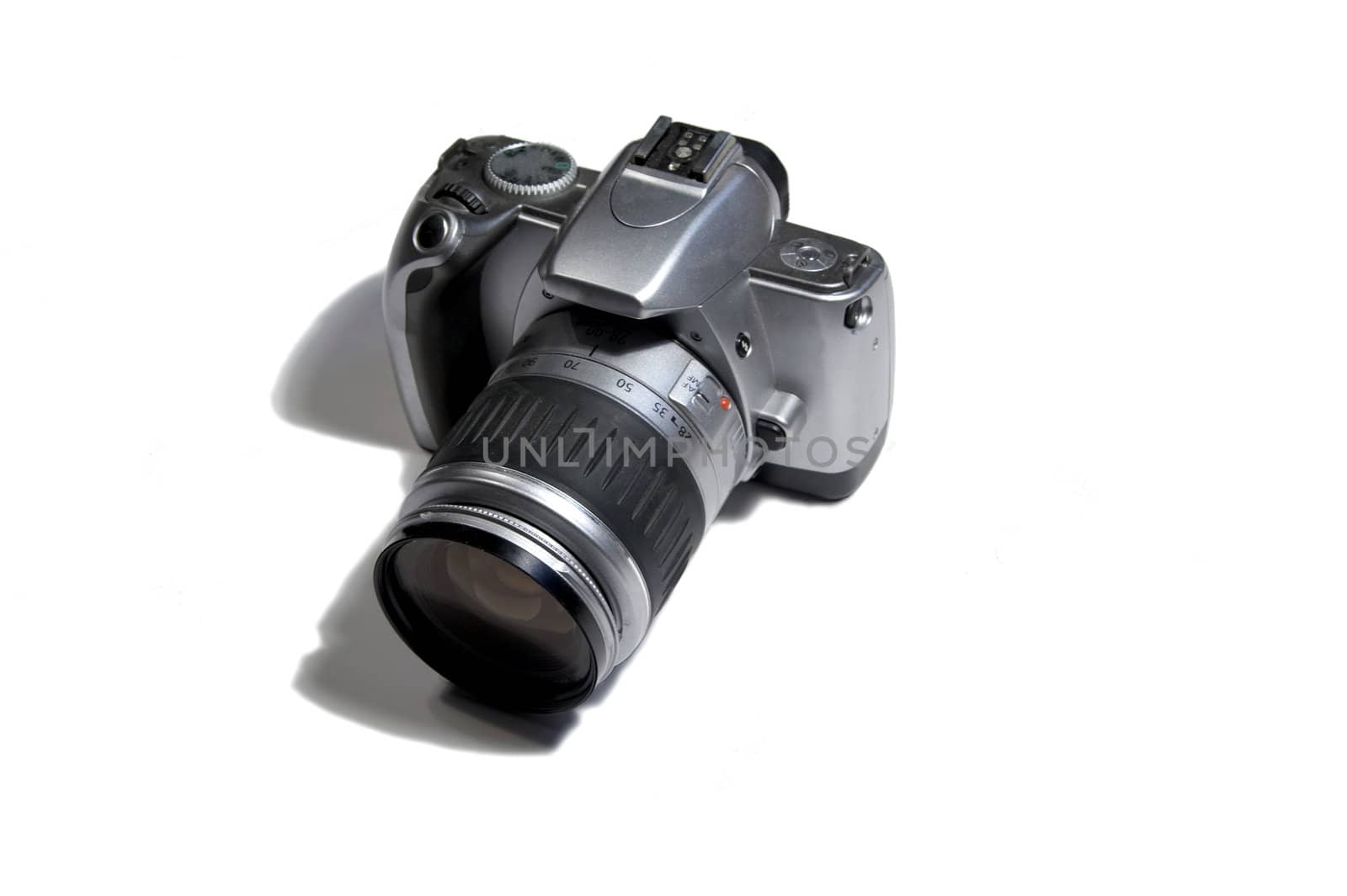 Silver SLR photo camera, by canon EOS system