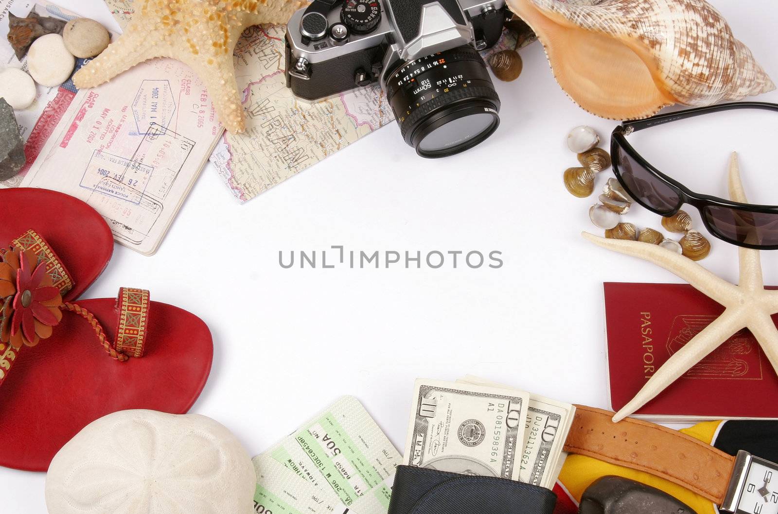 Travel frame on white with photo camera. glasses , shels, passports, money...
