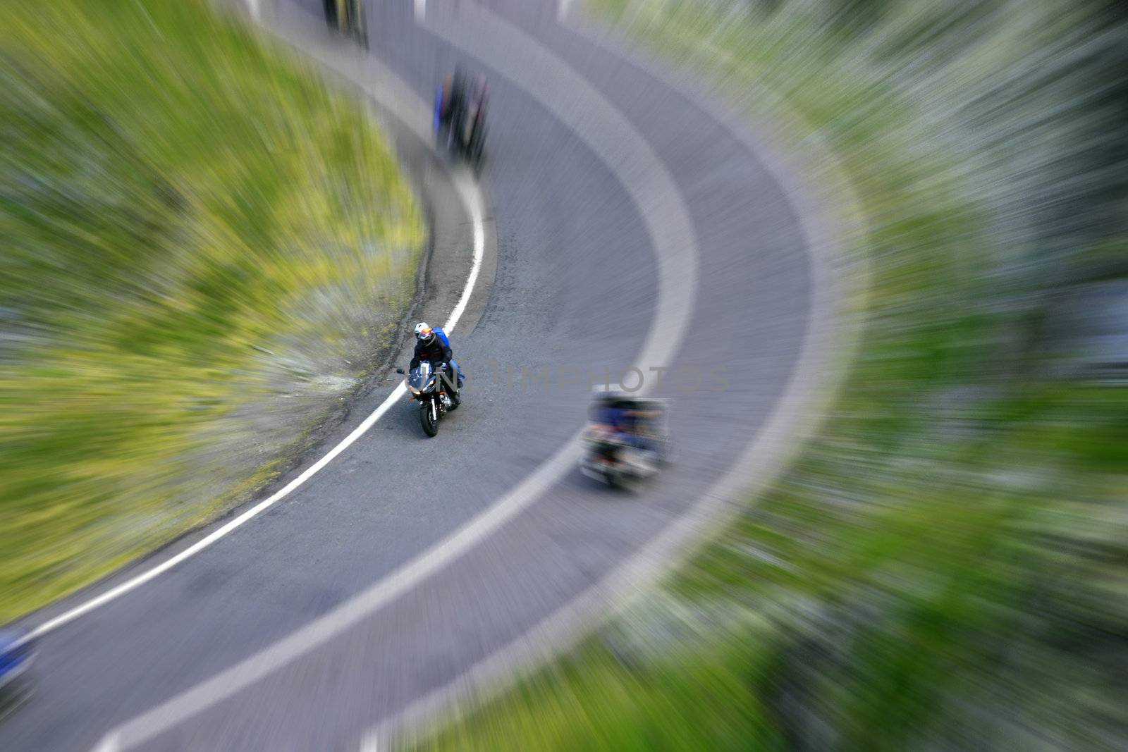 Motorbikes riding on a mountain road