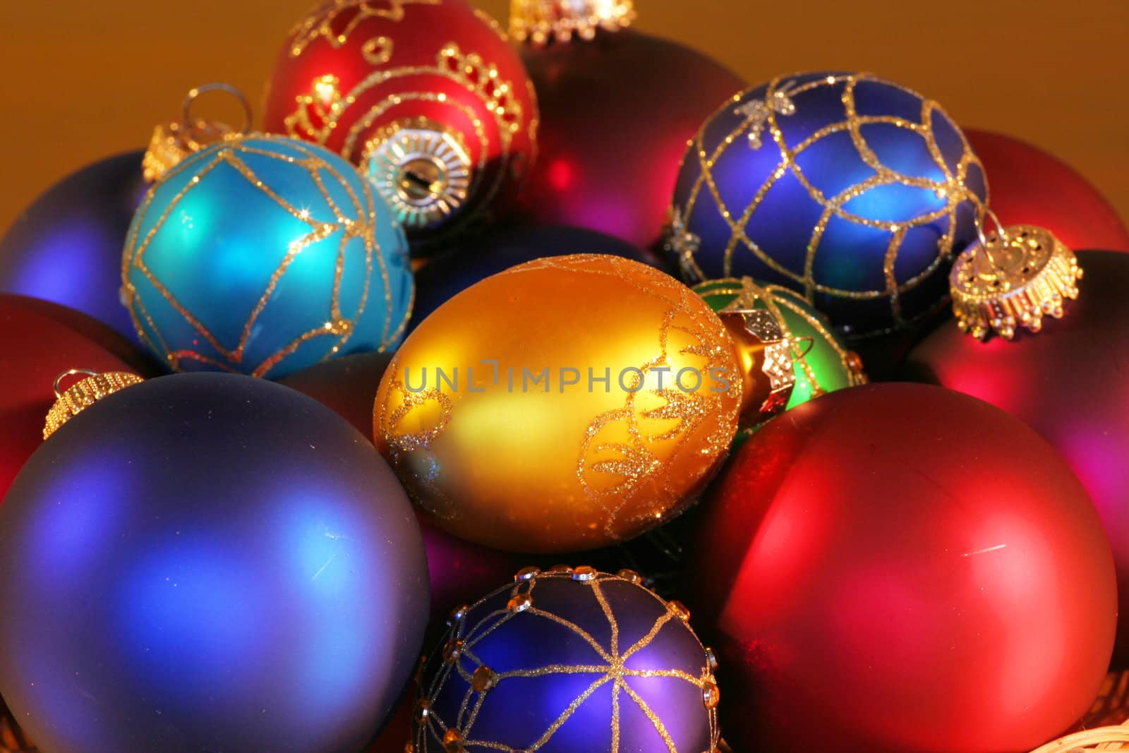 Large assortment of beautiful colorful Christmas ornaments.