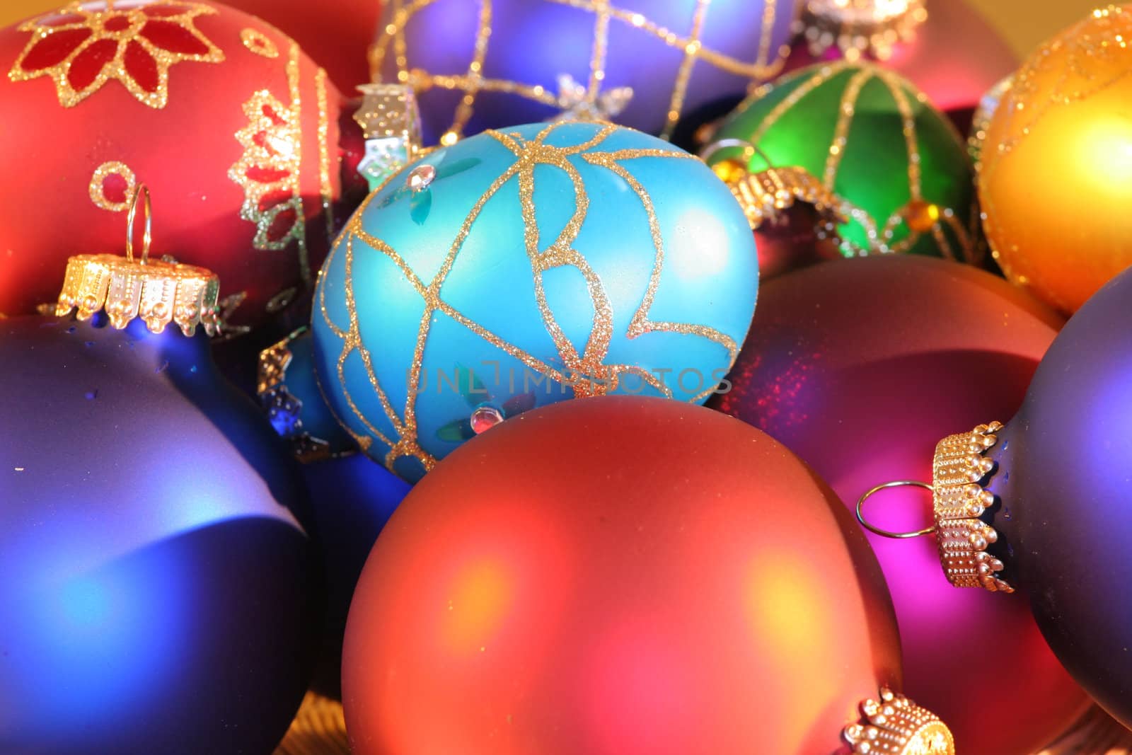 Large assortment of beautiful colorful Christmas ornaments.