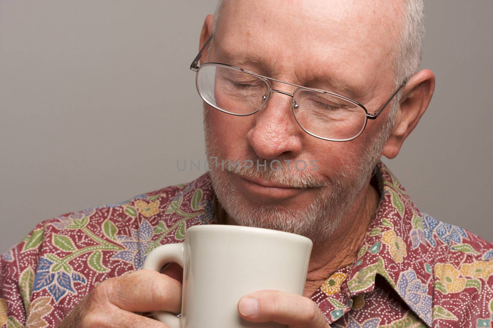 Senior Man Enjoys His Coffee by Feverpitched