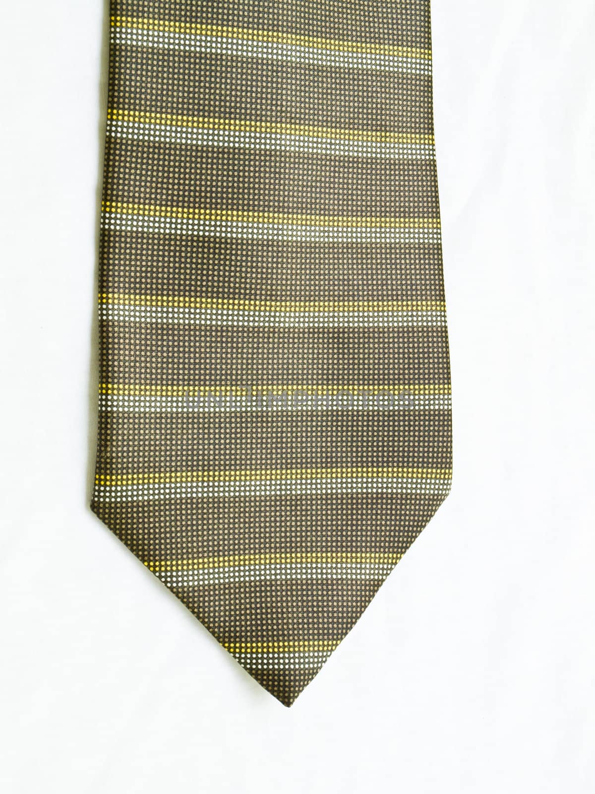 A striped yellow and black tie isolated on white background.