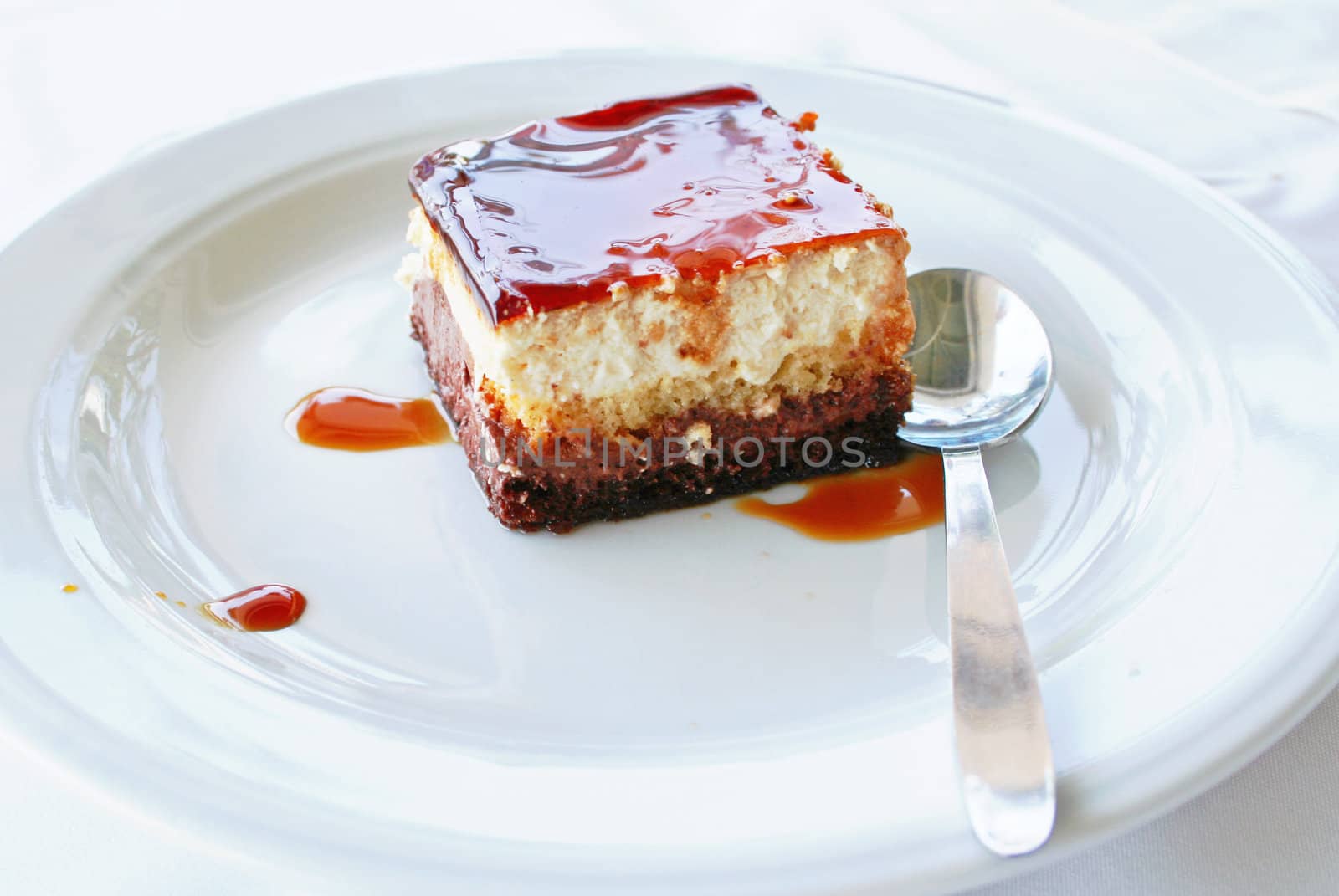 Dessert - Cheesecake with strawberry sauce and chocolate cream 