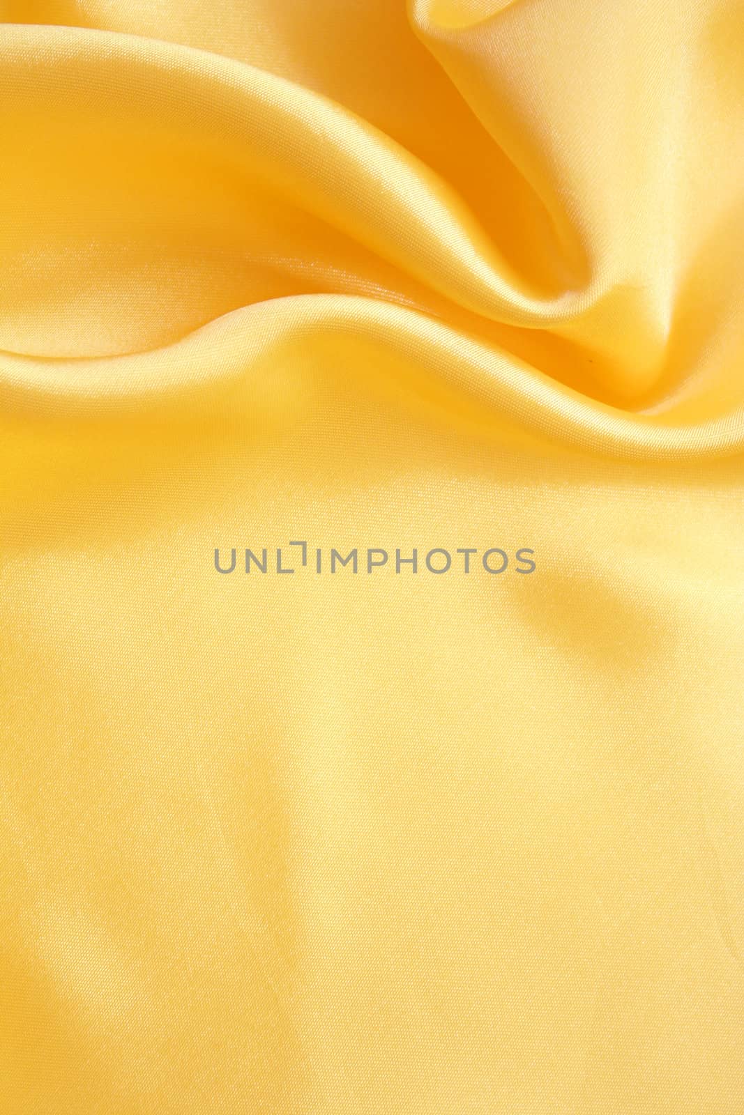 Smooth elegant golden silk can use as background 