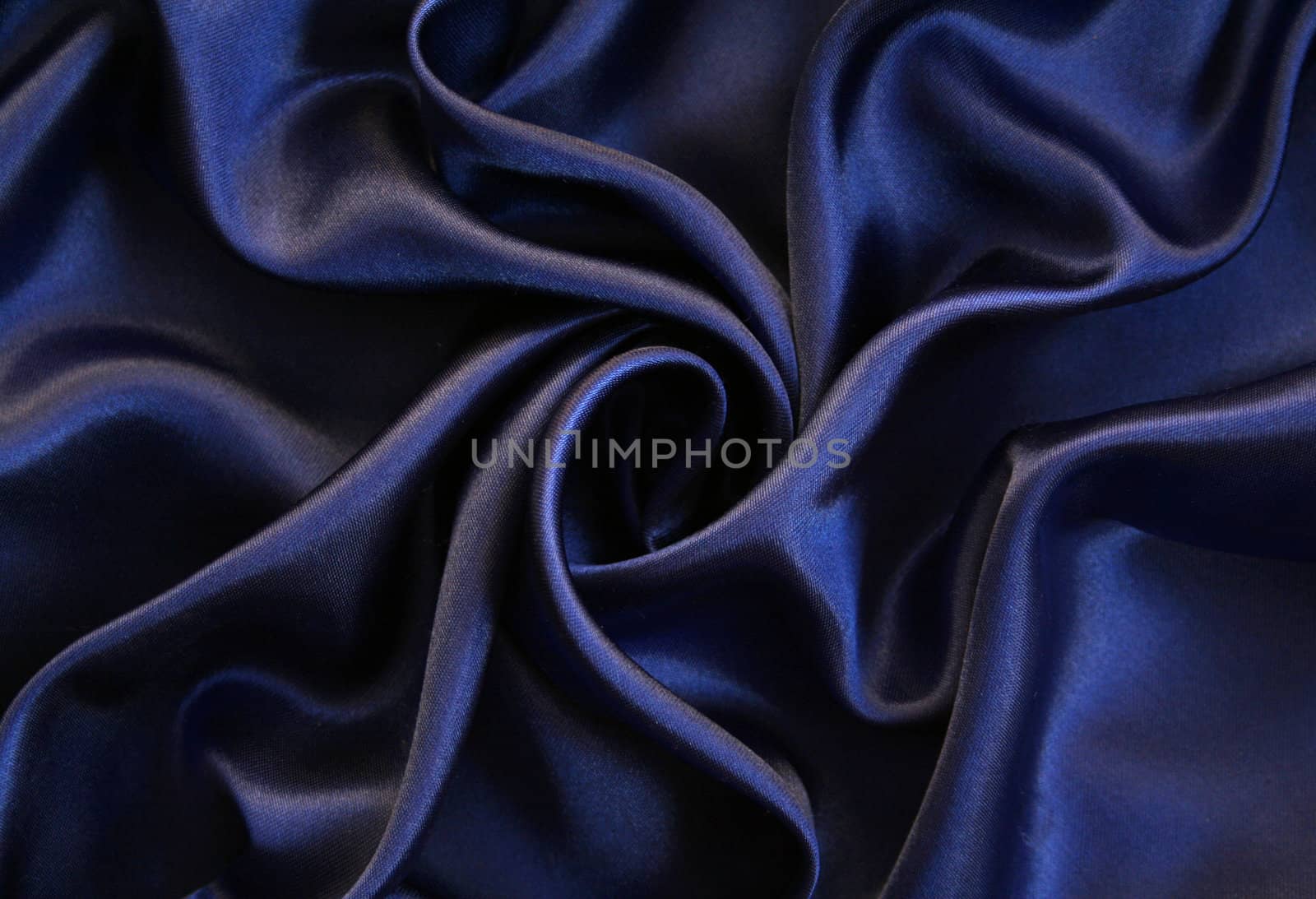 Smooth elegant dark blue silk can use as background 