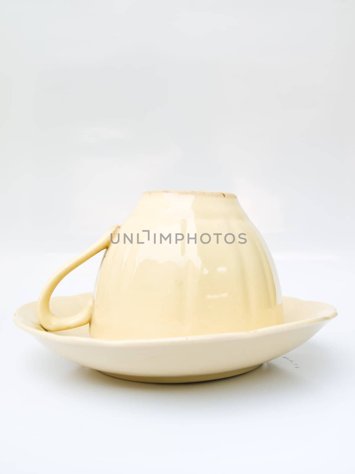 A tea cup isolated on white background by gururugu