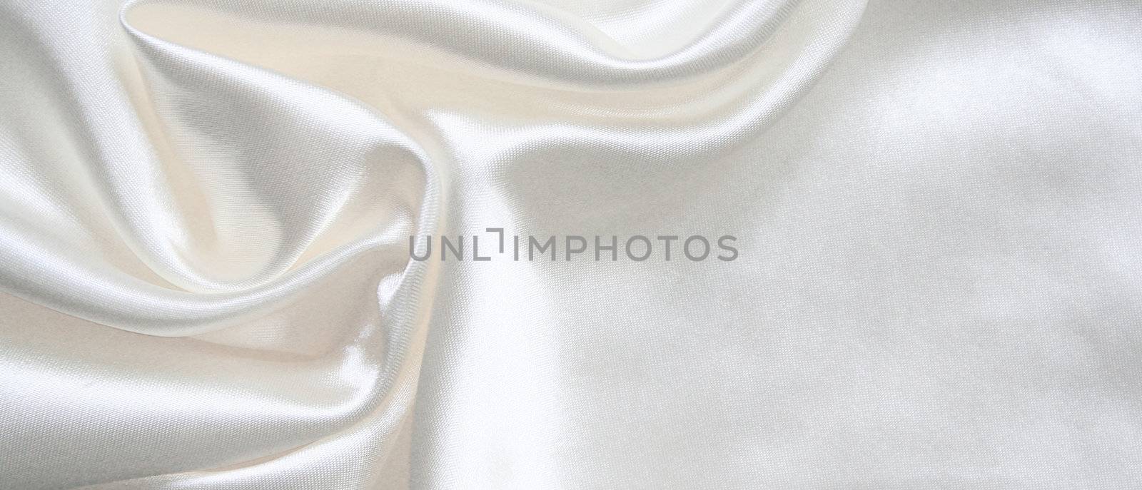 Smooth elegant white silk can use as wedding background 