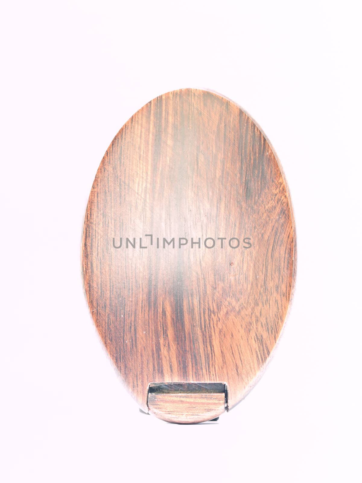 A cover of wooden cosmetic mirror isolated on background
