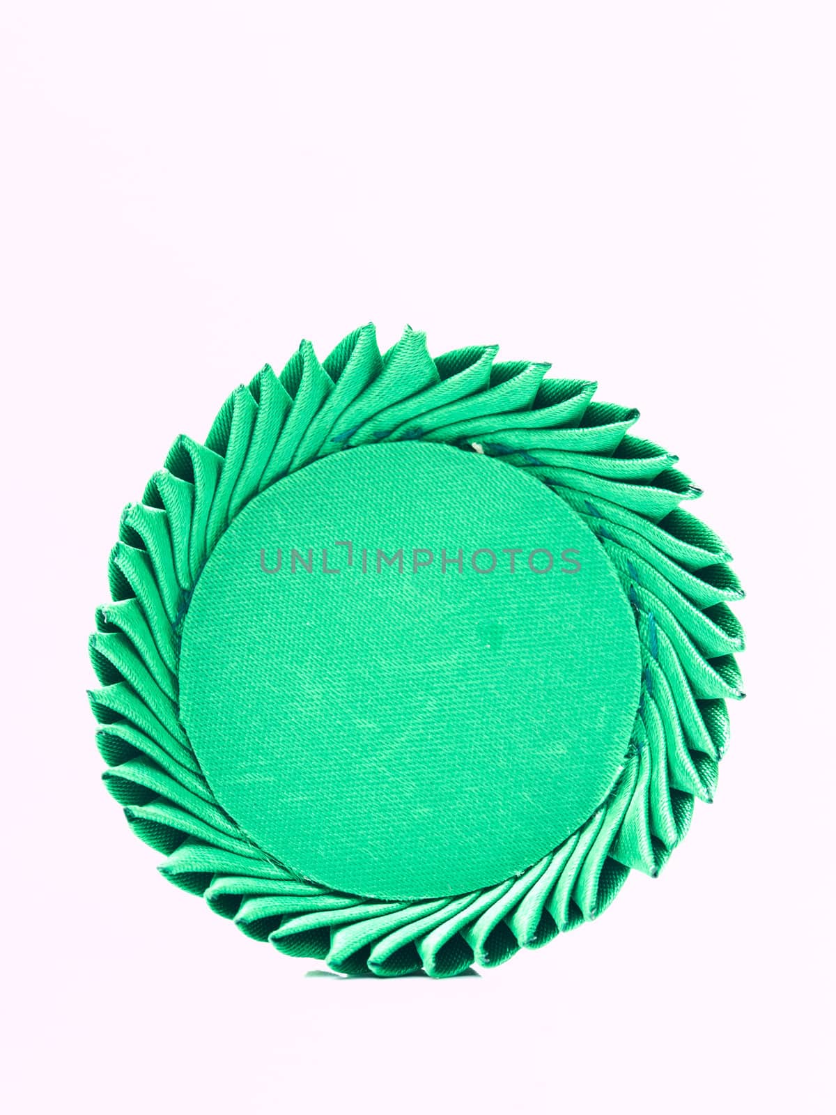 A miniature of Thai traditional tray made from green silk isolated on white background