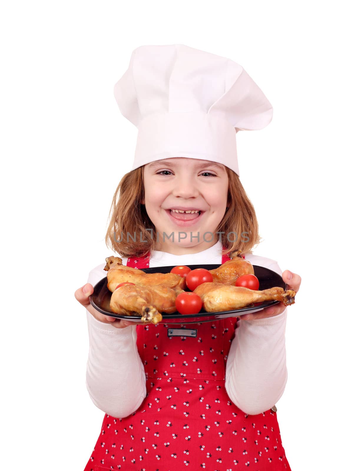 happy little girl cook hold dish with chicken drumstick