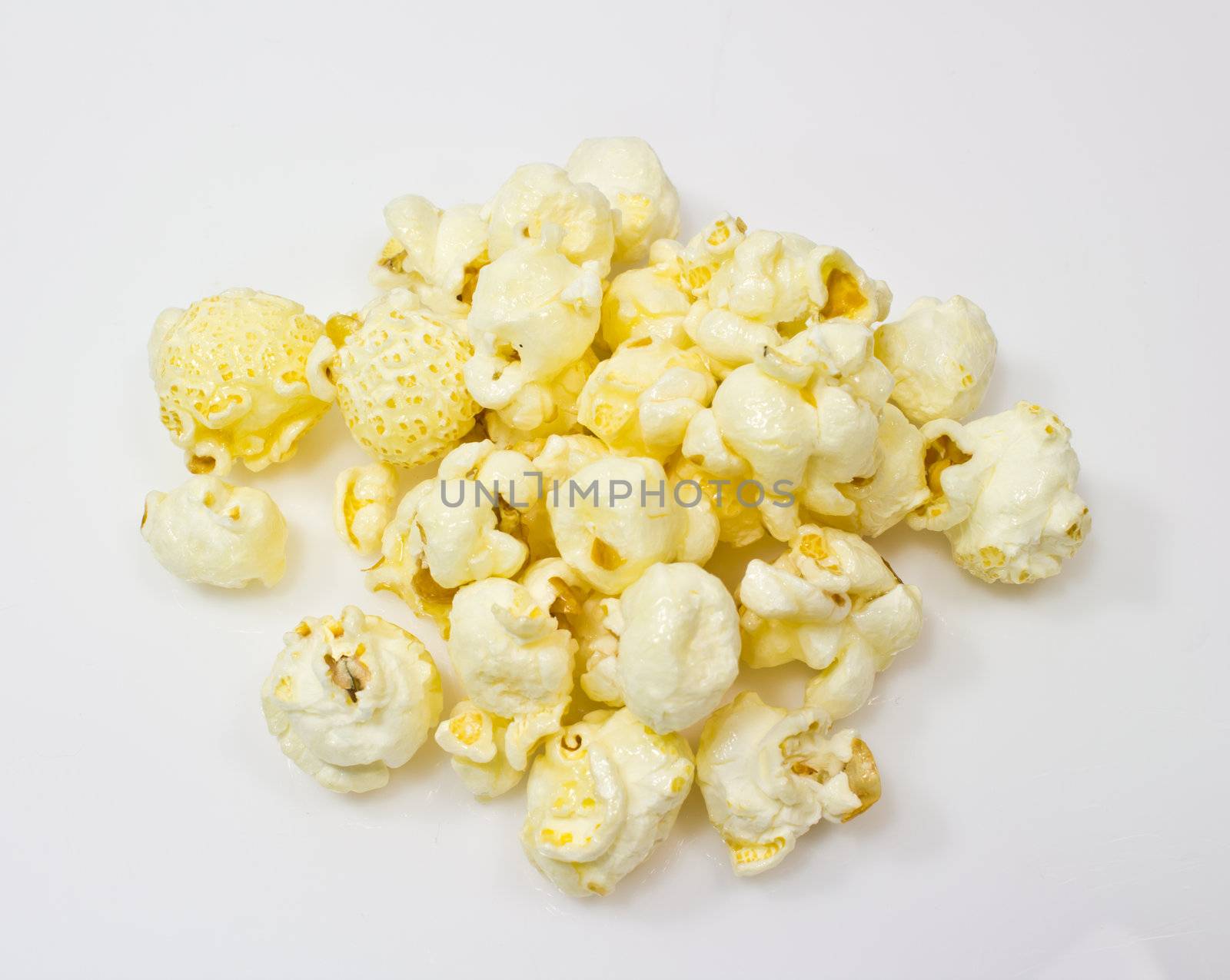 caramel candy popcorn on a white background by kurapy