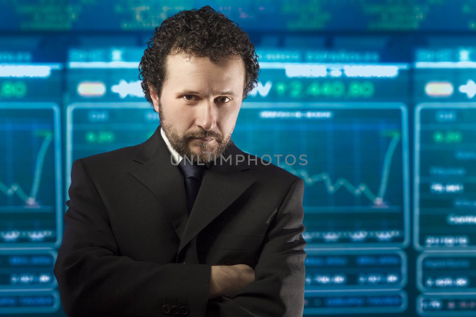 businessman with beard and black suit in the stockmarket