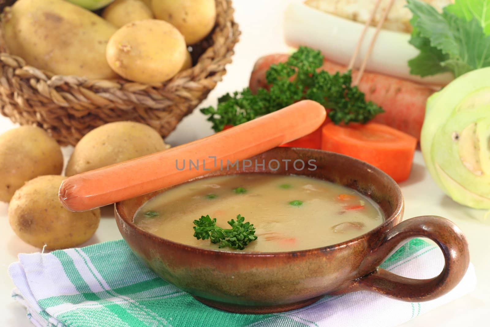 Cream of potato soup with bacon and vegetables