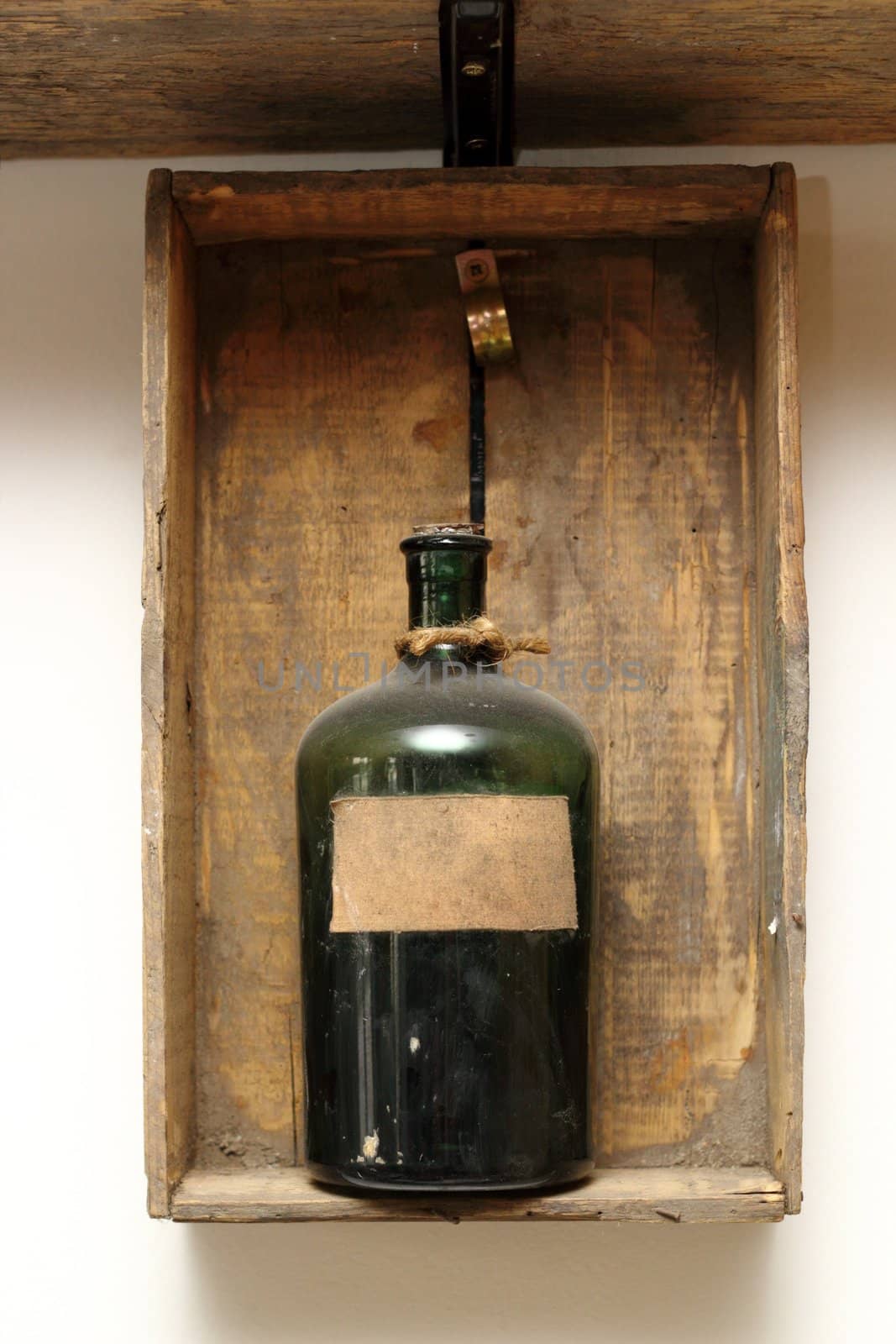 vintage decor with old chemical bottle on a wooden box