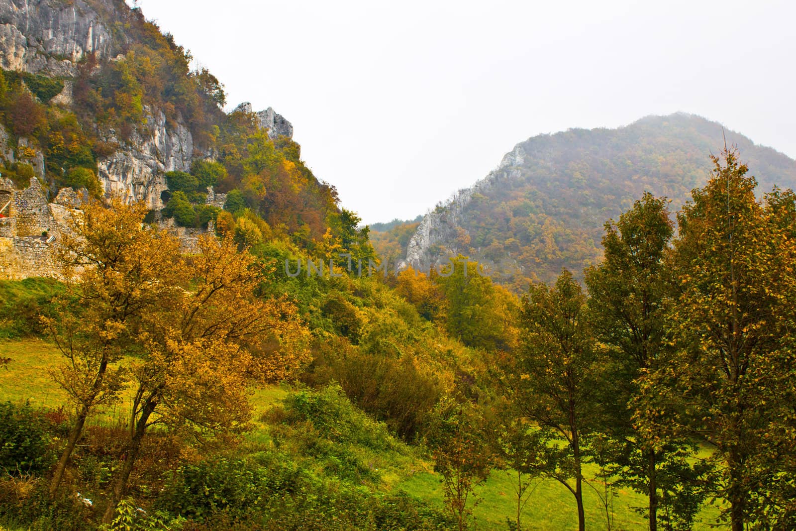 Autumn view of mountain ridge in fog, Kalnik, Croatia