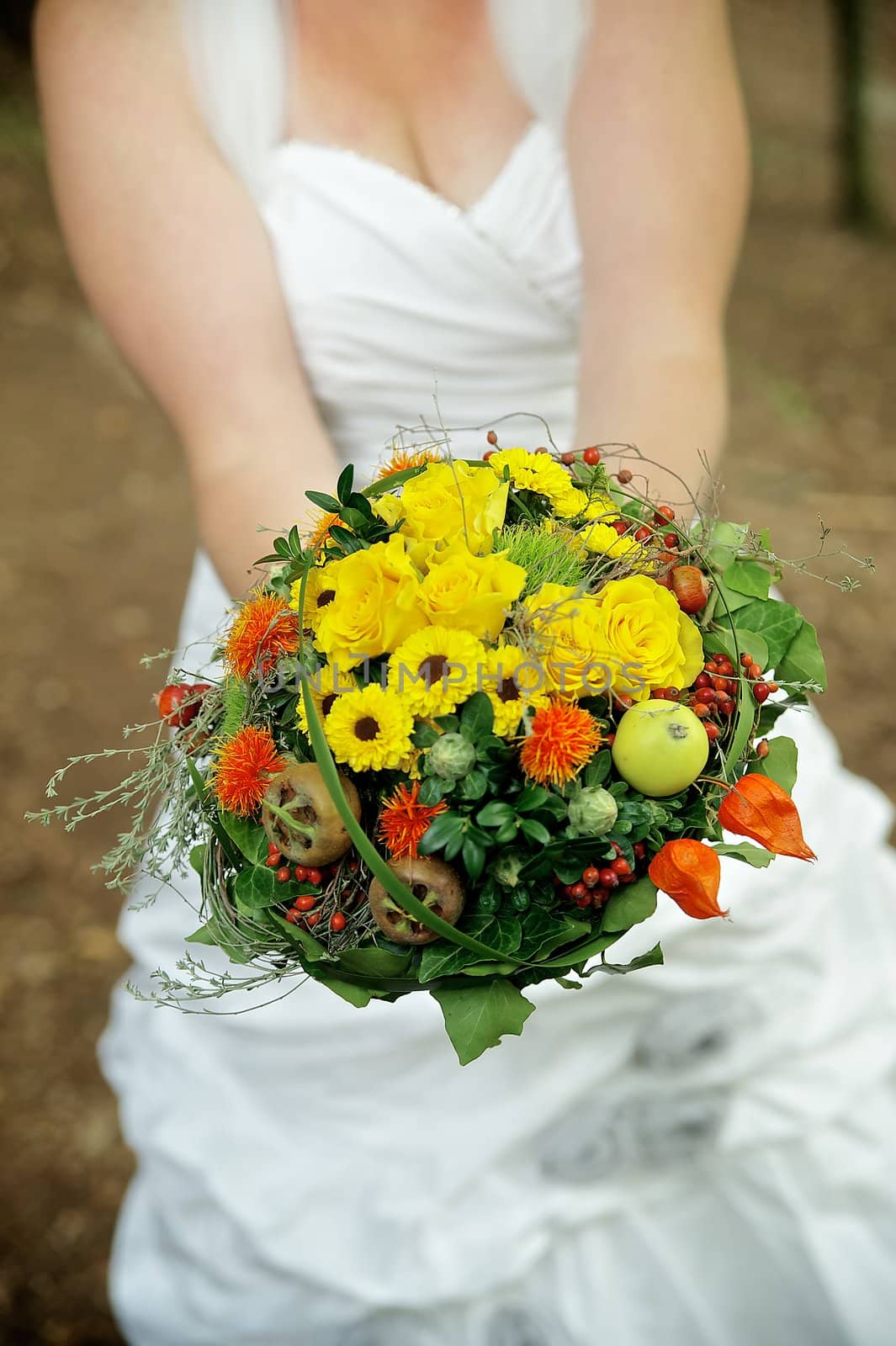 Woman with a colorful wedding bouquet