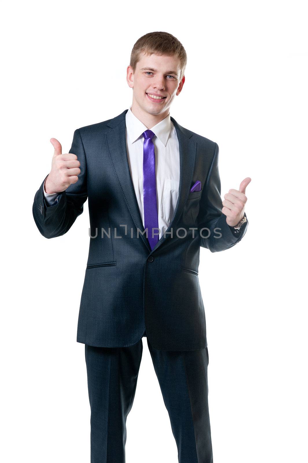 The young businessman in a suit isolated on white background