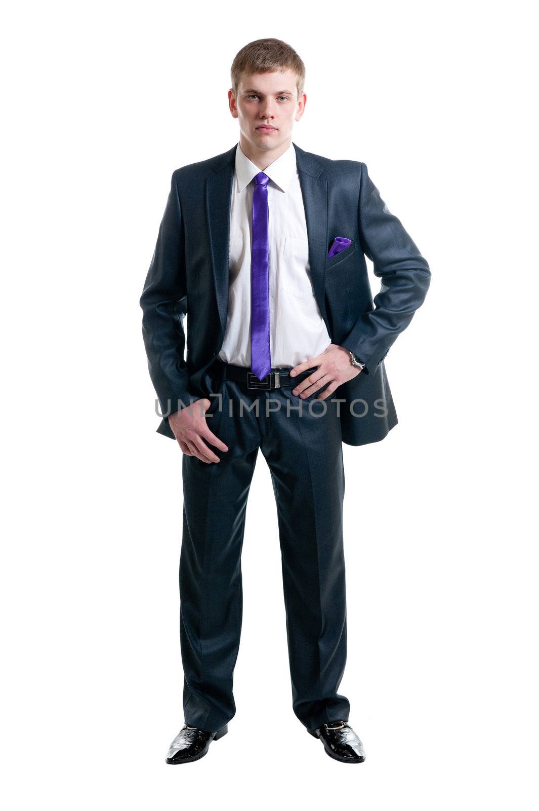 The young businessman in a suit isolated on white background