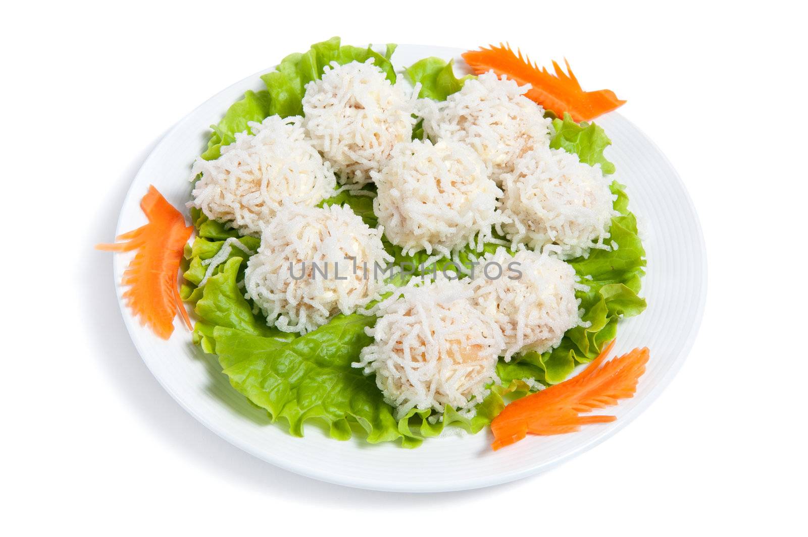 Shrimps ball on a plate isolated on white