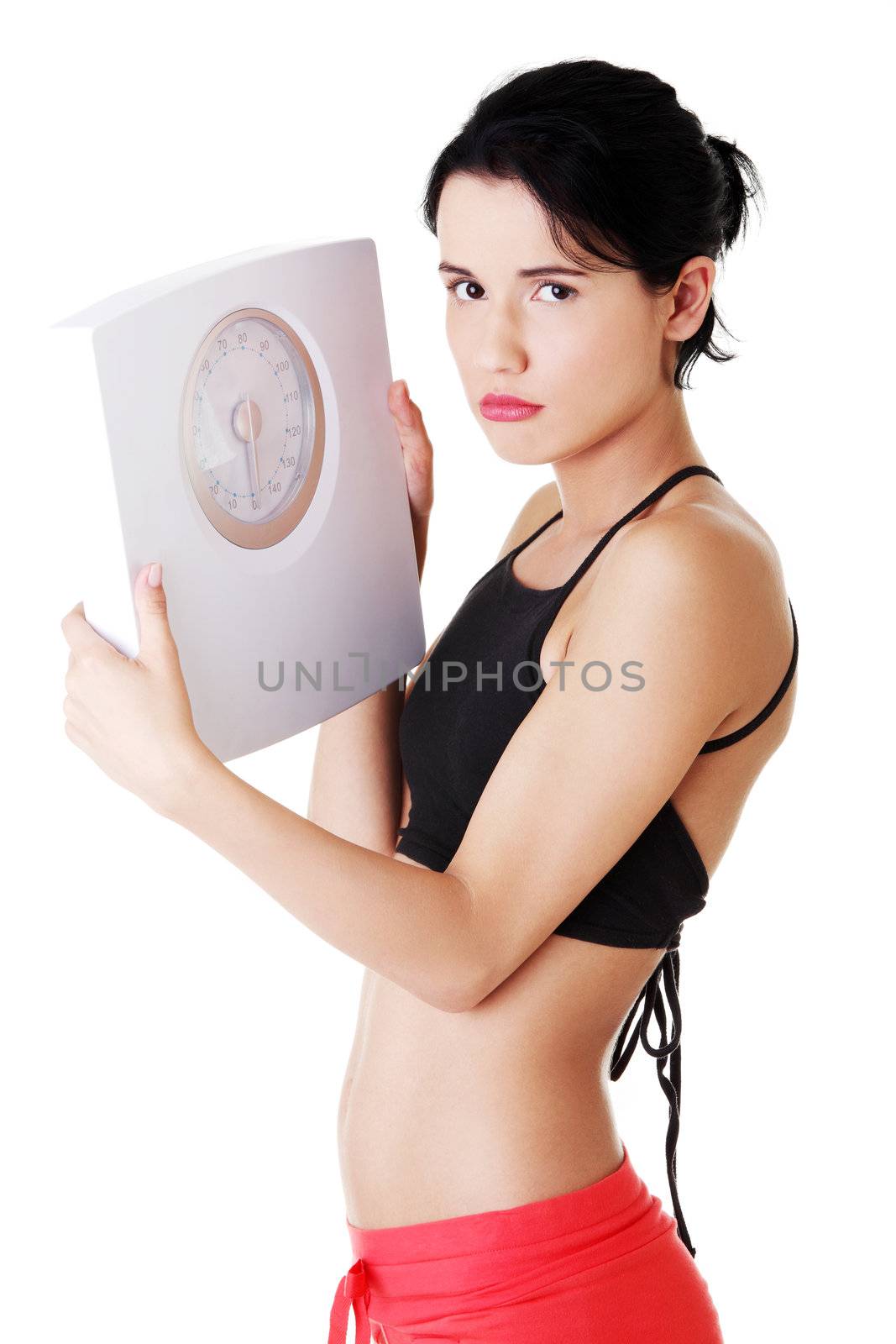 Frustrated woman with scale by BDS