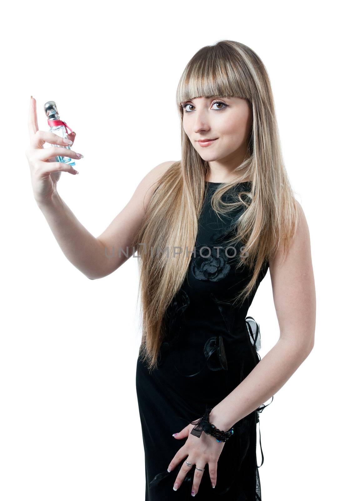 The beautiful girl in black dress isolated on white