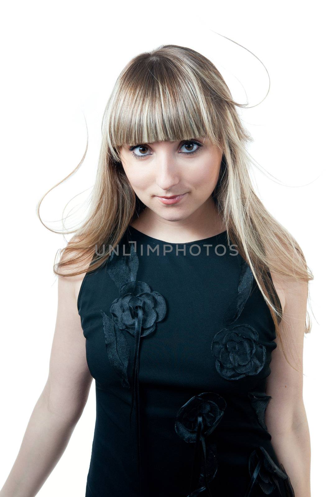 The beautiful girl in black dress isolated on white