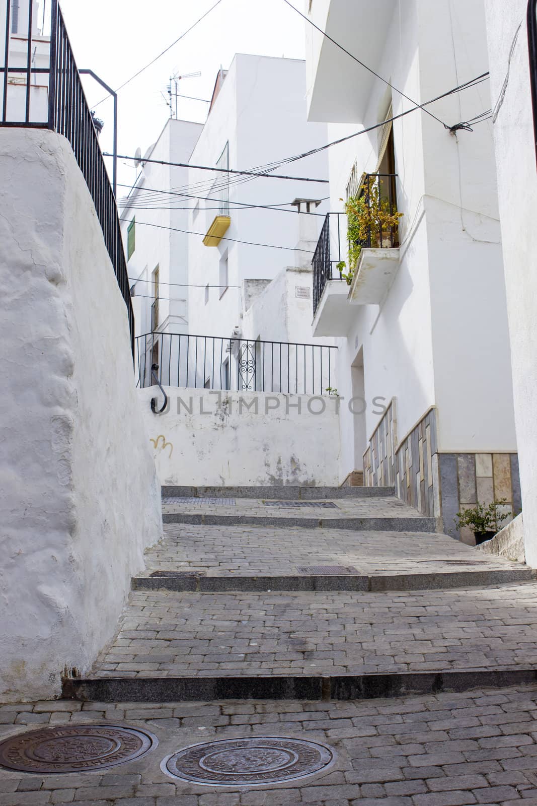 Street in Almunecar, Andalusia, Spain by miradrozdowski