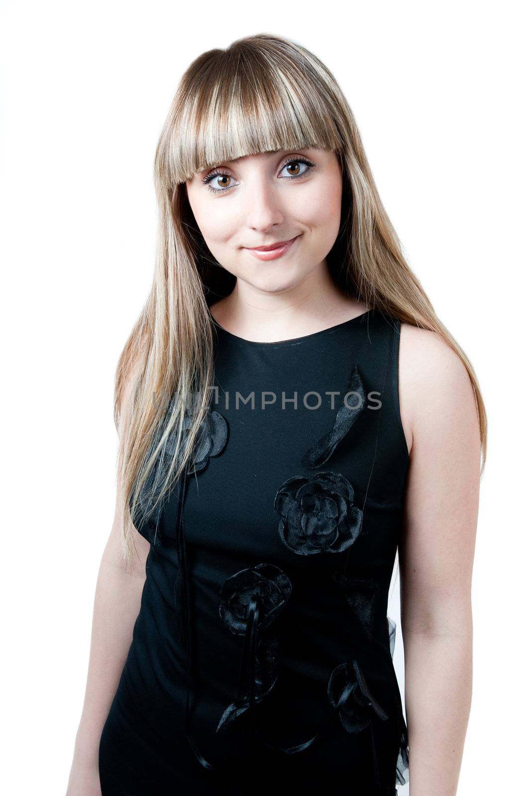The beautiful girl in black dress isolated on white