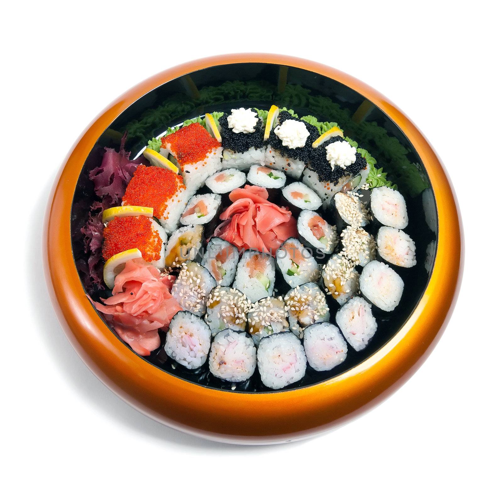 Set of sushi in wooden circle plate isolated on white