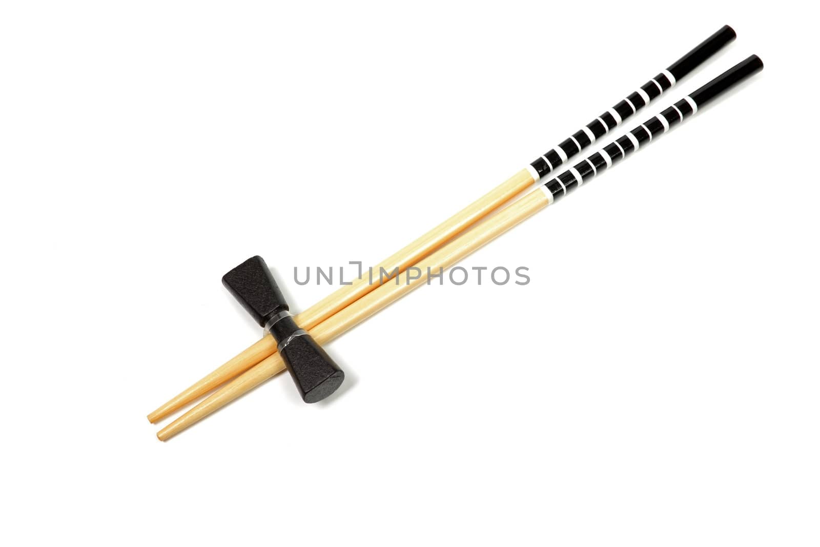 Unused japanese chopsticks isolated on white background. by borodaev