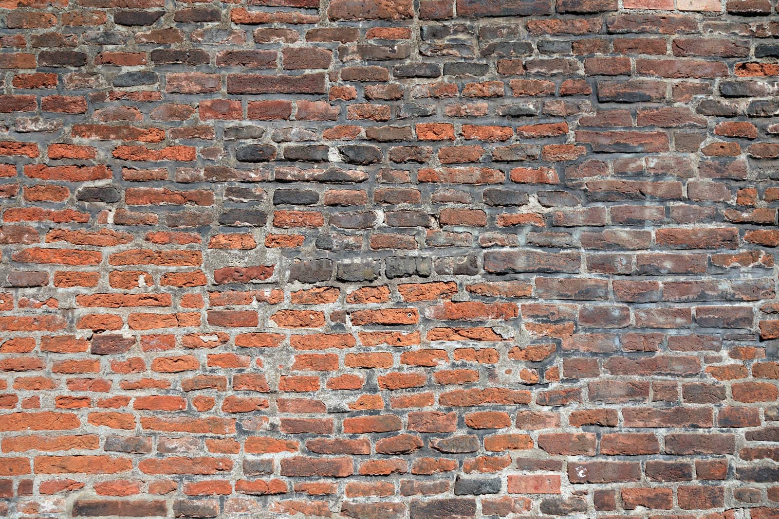 Old brick wall in Prague as textured background or backdrop.