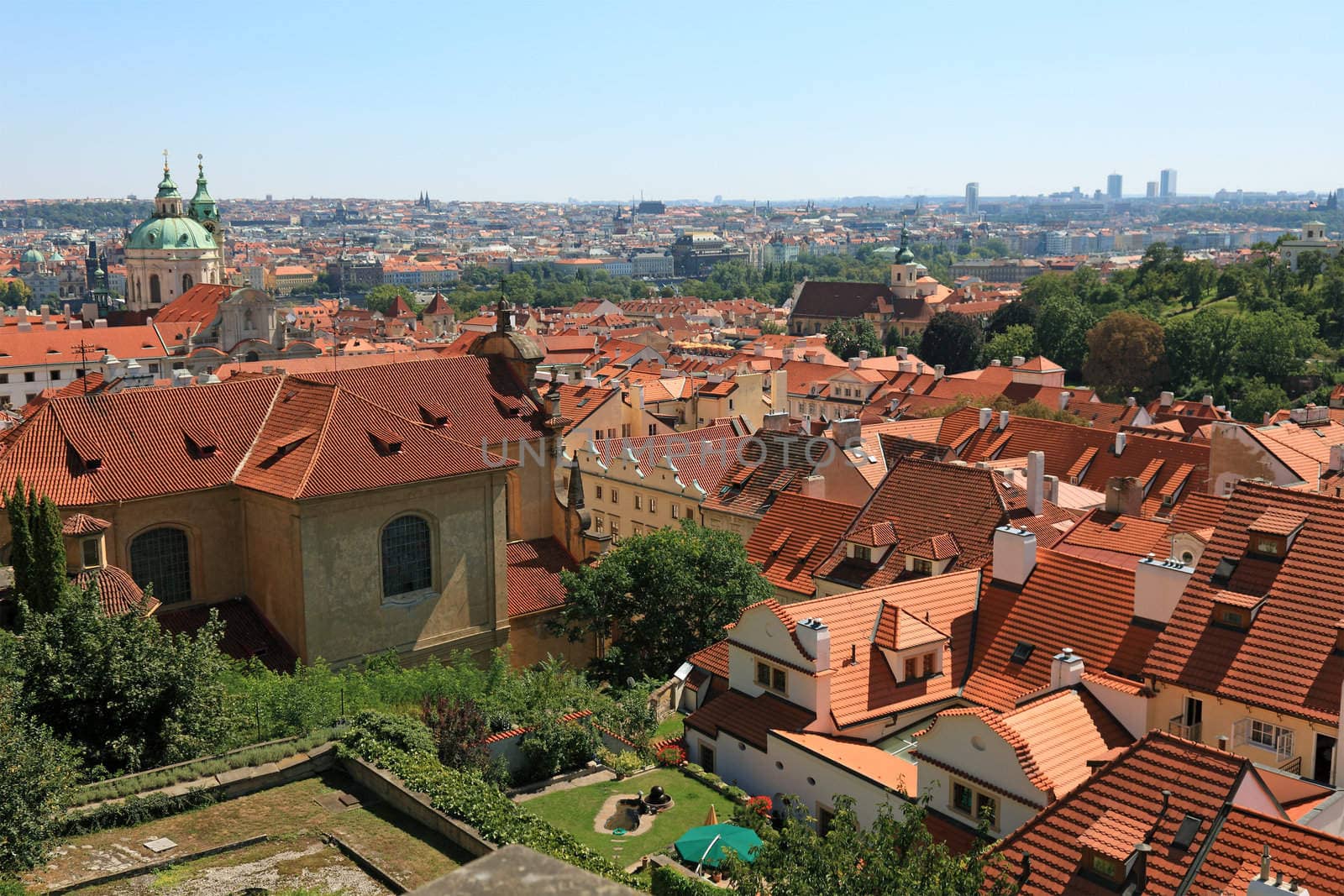 Cityscape view of old Prague, lot of tiled roofs, Czech republic by borodaev