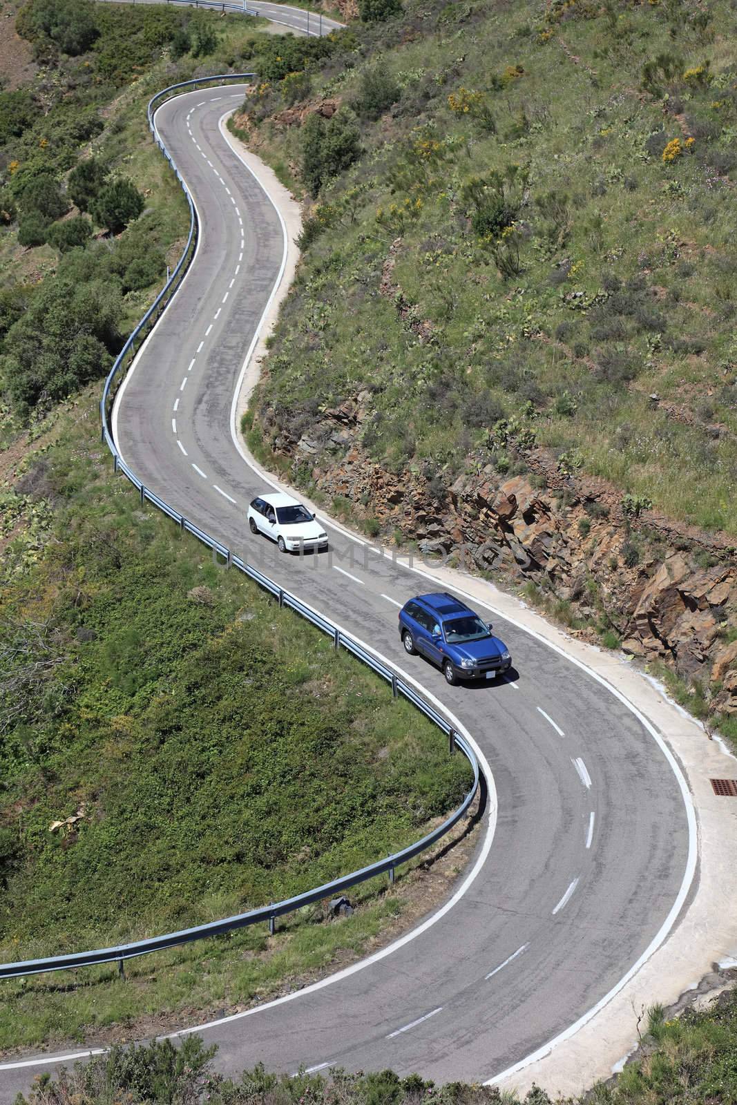 Serpentine road in Pyrenees, borderland of France and Spain, Mediterranean Europe.