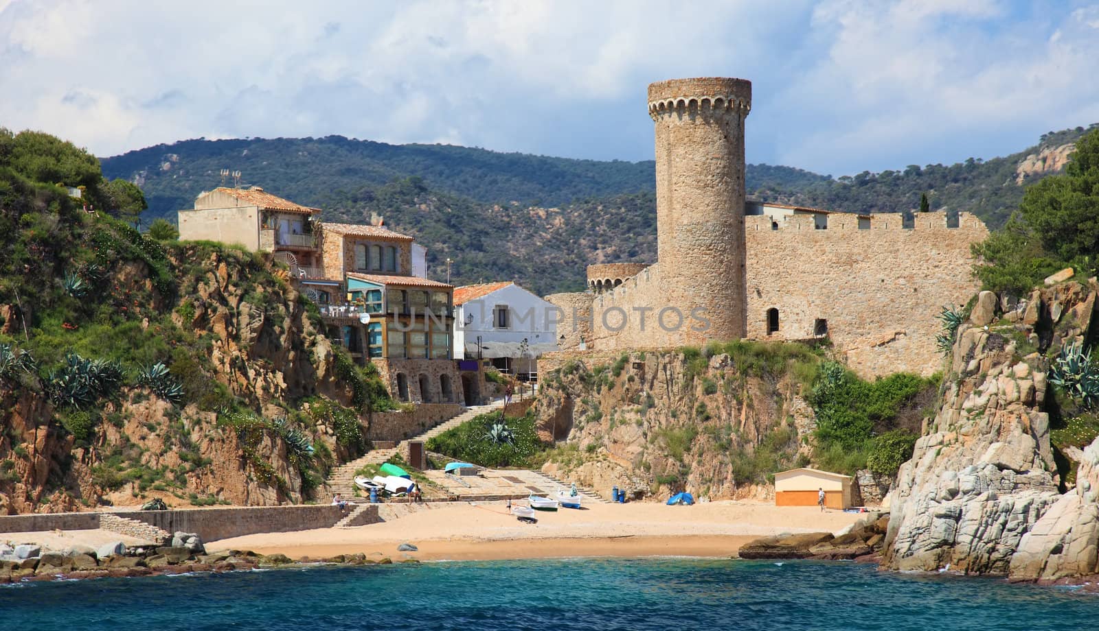 Castle in Tossa de Mar, view from sea, Costa Brava, Spain. by borodaev