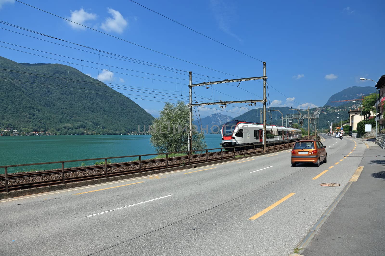 Road and train along Geneve Lake, Switzerland, Europe.