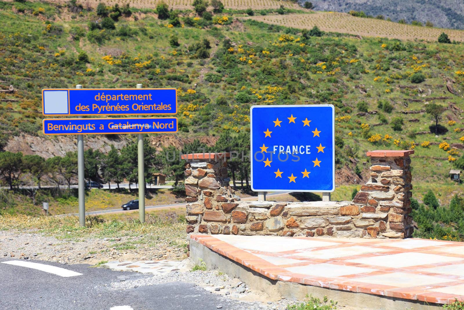 Border sign between France and Spain. by borodaev