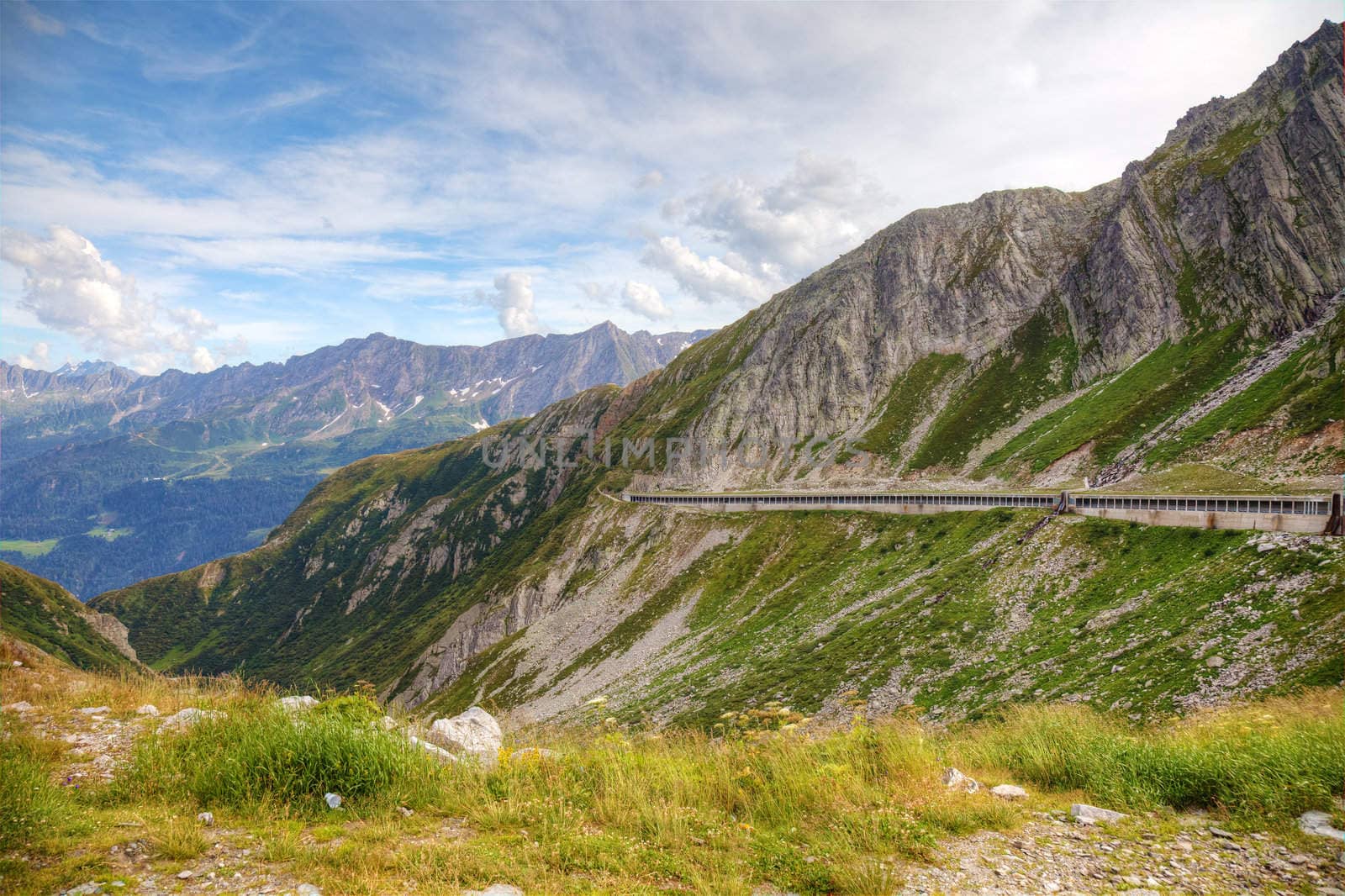 Alpine road in swiss mountains, Europe.