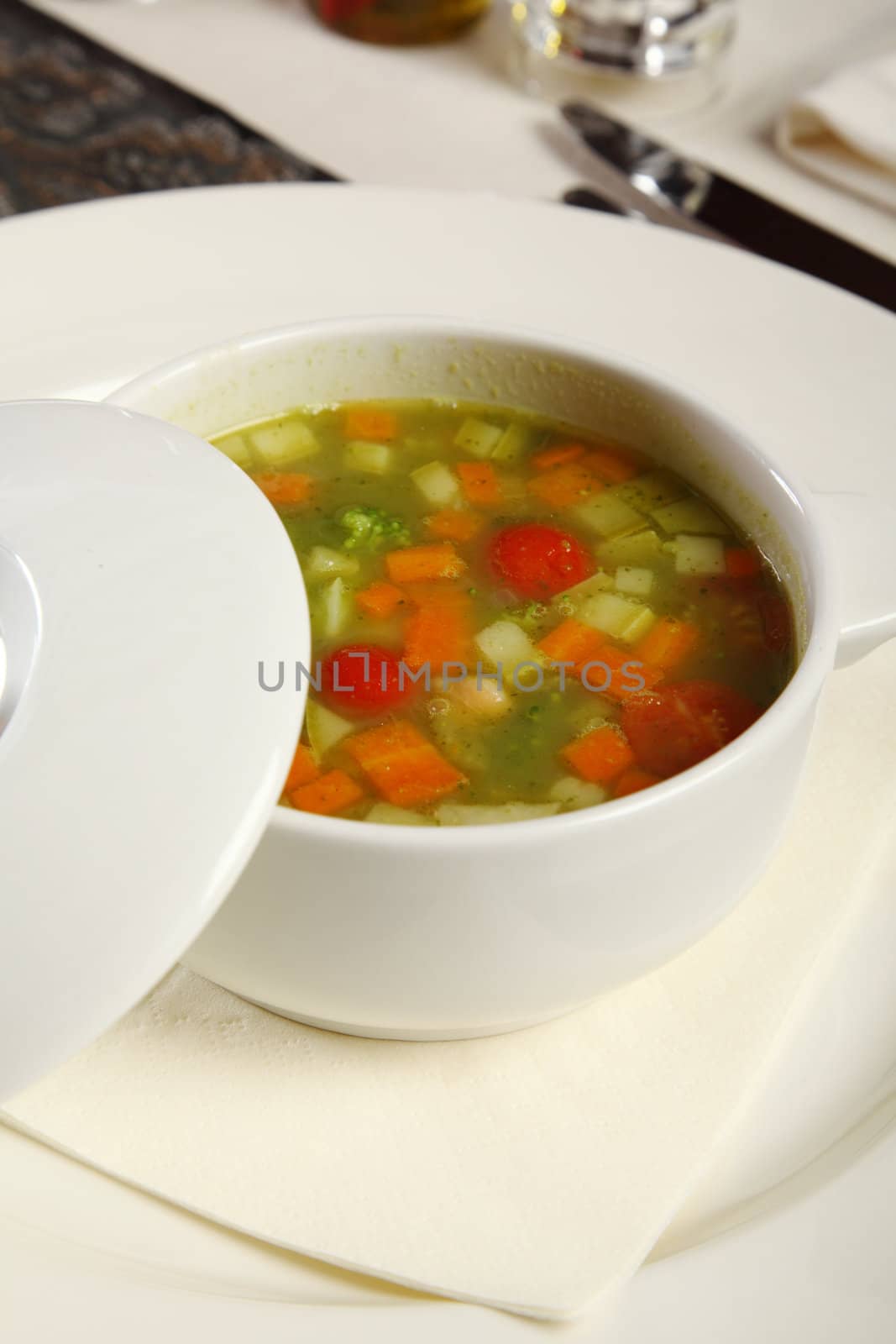 Vegetable soup served in a cup at restaurant