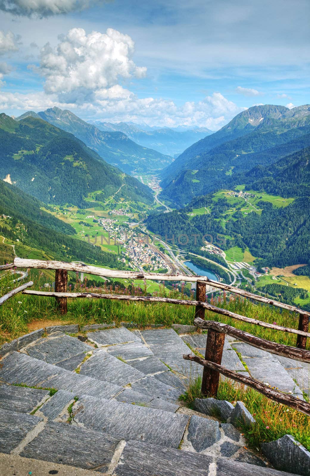 Alpine valley view from peak, Switzerland, Europe. by borodaev