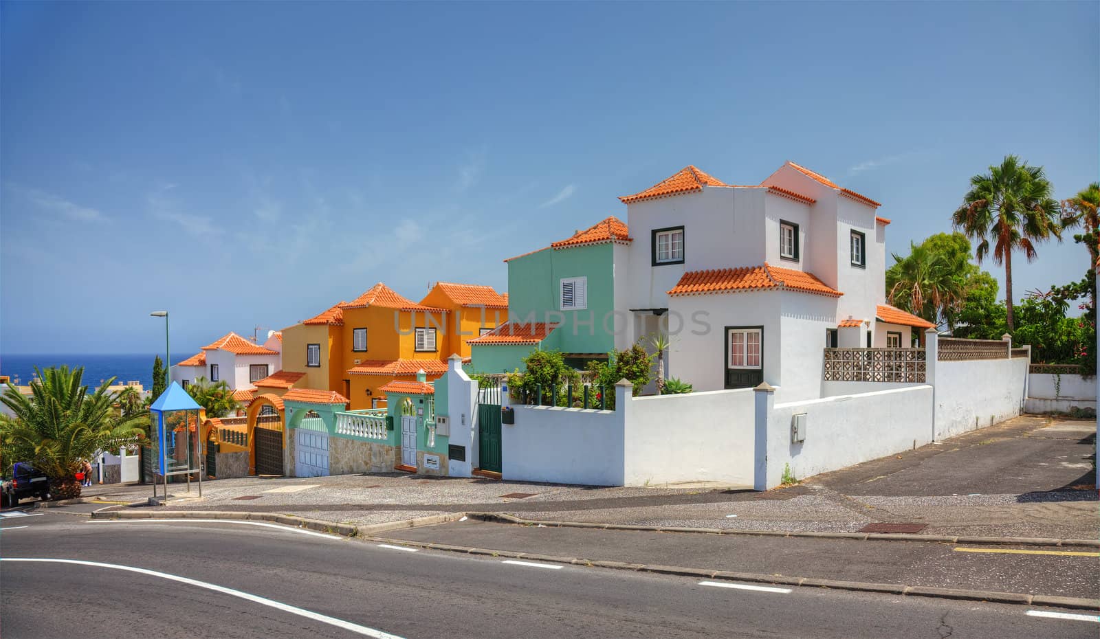 Street with modern villas, Tenerife island, Spain. by borodaev