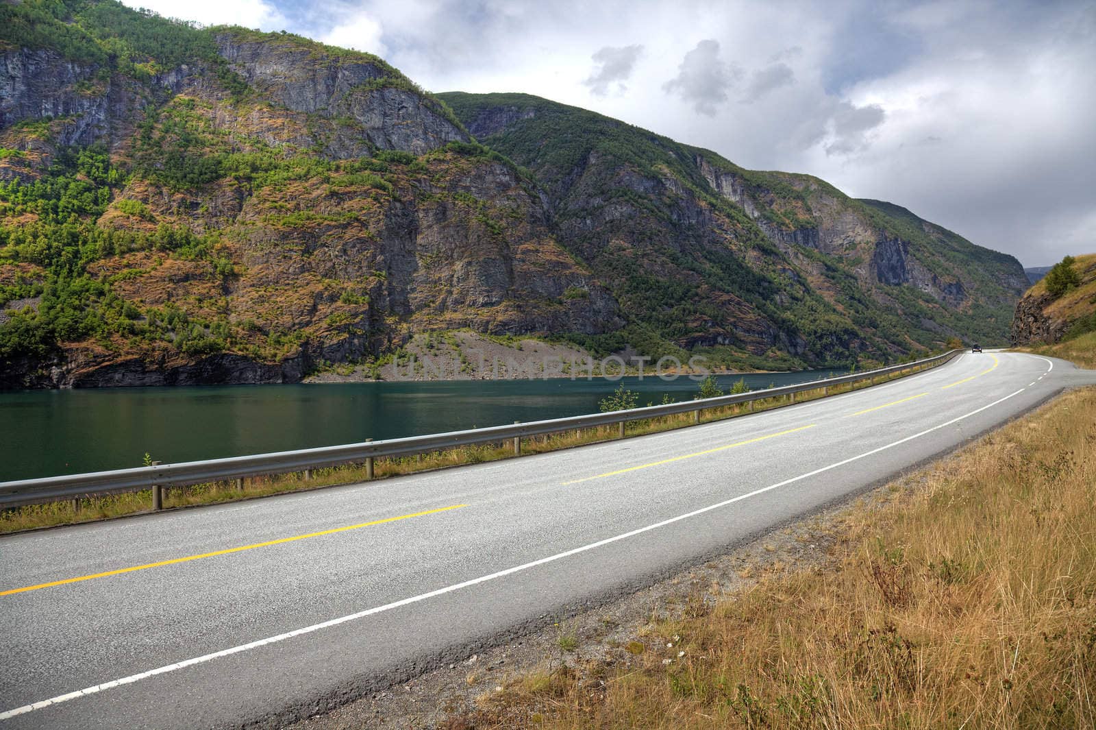 Picturesque landscape and norwegian road, scandinavian Europe. by borodaev